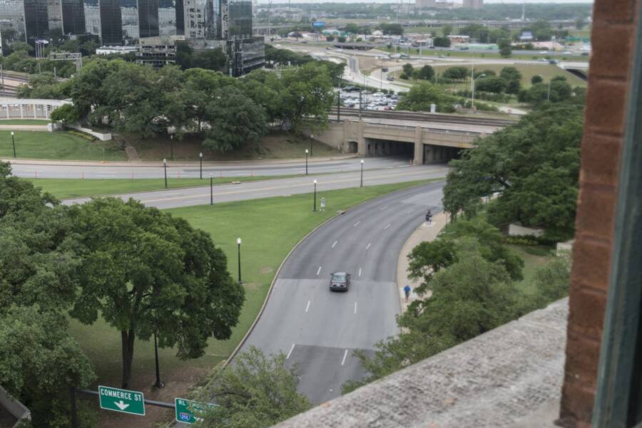 Title: View, in 2014, of Dealey Plaza from a seventh-floor window of the Texas School Book Depository in Dallas, Texas, one floor above the